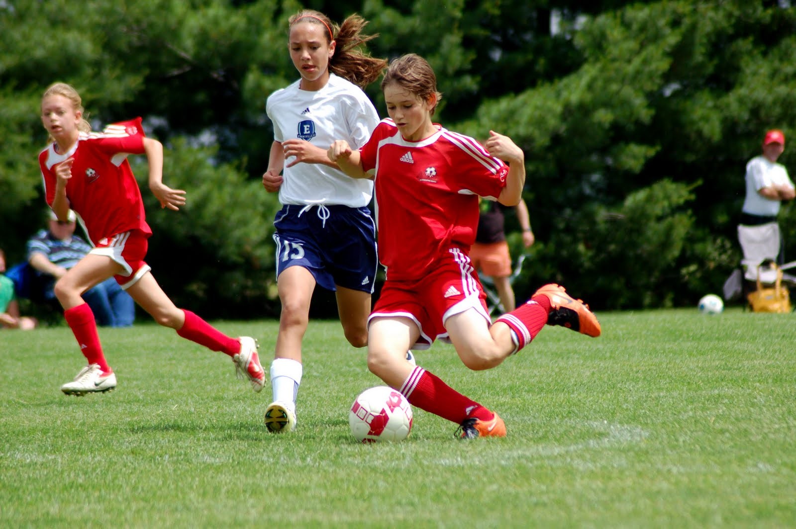 Hectichousehold Action shots of Lexi playing at a recent soccer tournament