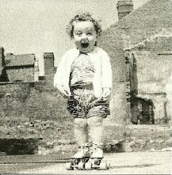 I was always a happy soul. Aged 2 on an unidentified London Bombsite