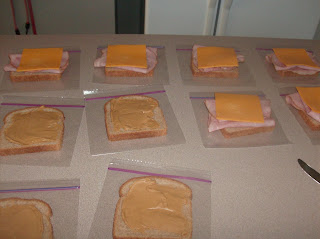 Six of the slices of bread are topped with turkey and a slice of cheese, the other four are topped with peanut butter.