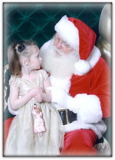Kylie and Santa 2010