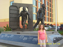 Skylar in front of VA military monument