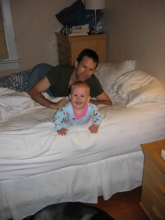 Hanging out in Mom and Dad's bed!