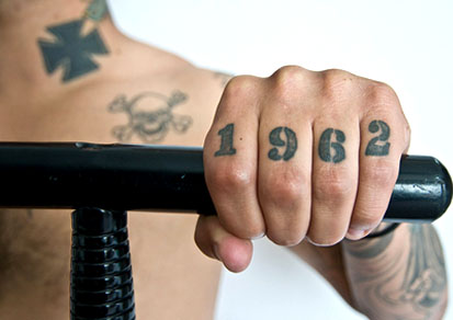 Many folks get their knuckle tattoo with some words written.