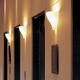 Rodolfo Dordoni Contemporary Est Sconce by Flos | Stardust Modern 