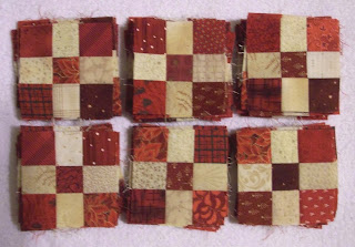 Eighty reds and creams nine patch blocks for the mystery quilt
