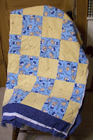 blue and tan flannel quilt