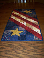 red, white and blue tablerunner that resembles our flag