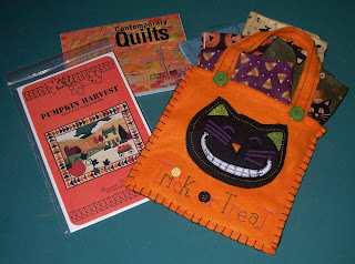 postcards, fall pattern and bag with fat quarters of fabric