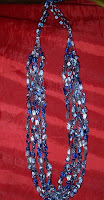 crocheted, blue, four strand  necklace