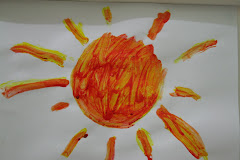 Handpainting Sun by Evan
