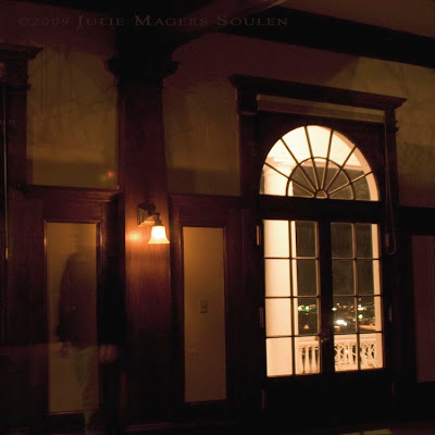 Dark room with window and ghost at historic Stanley Hotel