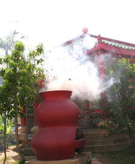 Firecrackers at the Shrine in Karon Plaza