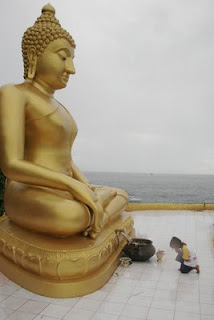 My son and Buddha image at Koh Kaew Yai