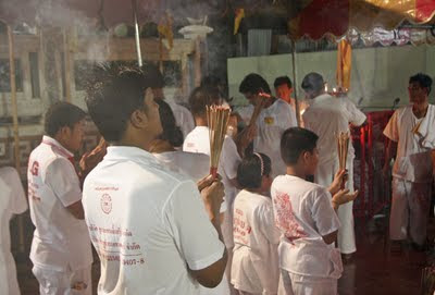 Prayers and incense at Kathu shrine