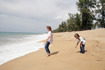 Our kids playing at Mai Khao Beach
