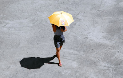 So hot in Phuket you need an umbrella