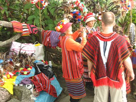 dressing up in Igorot costumes at the Mines View Park in Baguio City