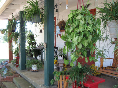 FOLKWAYS NOTEBOOK: A COUNTRY HOUSE WITH A COUNTRY PORCH GARDEN