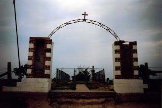 This is the cemetary at the site of the Wounded Knee Massacre. In 1890 three hundred members of the Pine Ridge Lakota Sioux were promised safe passage to a reservation in Nebraska if they gave up their weapons. They were rounded up and shot. Read about it here: http://en.wikipedia.org/wiki/Wounded_Knee_Massacre Photo credit: John Hamilton