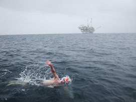Chris - Swimming past the oil rigs