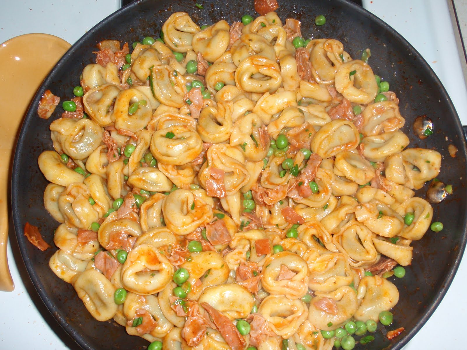 My Italian Grandmother Tortellini with Peas and Prosciutto