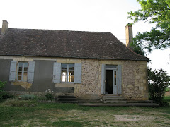 Ugly stucco removed to expose original stone wall
