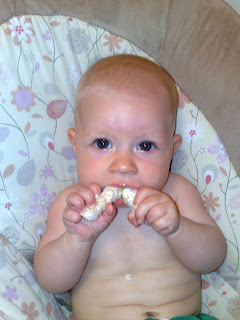 Baby eating rice cakes