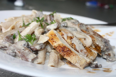 plate with chicken, mushrooms, and creamy pasta