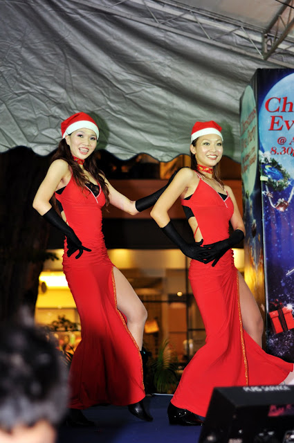Christmas Eve Celebration Pretty Dancers in Red Dress Dancing