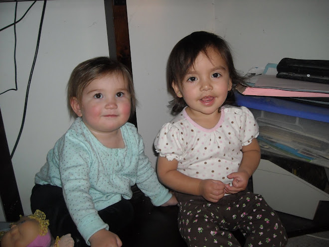 Daya and Calla under the computer desk