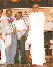 Dr P J Sudhakar receiving Award from AP Cheif Minister Dr K Rosiah