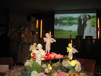 An image of the main table with angel decorations