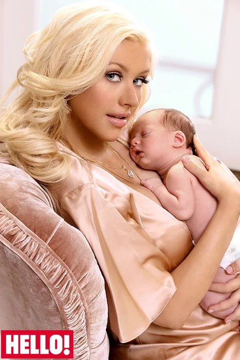 Christina Aguilera and one month old Max on the cover of Hello! magazine