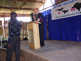 Alan speaking at Nexus Seminary Uganda first graduation 10/6/07