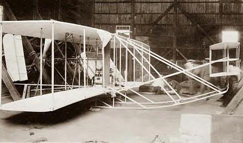 Wright Bros plane in hanger at Washington, DC 1908