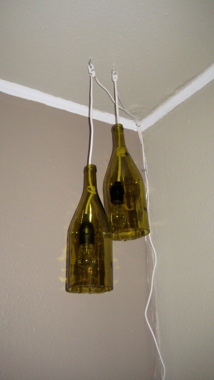 Remodelaholic How to Make a Glass Wine Bottle Pendant Light DIY