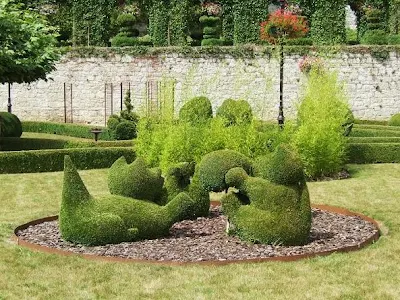 box trees sculptures in Parc des Topiaires in Durbuy