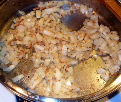 Chicken ravioli onions in a pan