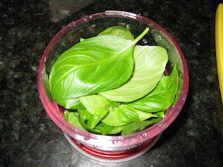 basil leaves in cutting bowl