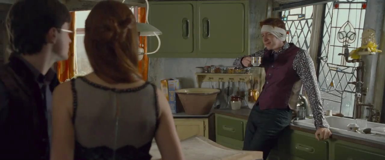 Harry Potter Freaks site toothbrush in his ear D