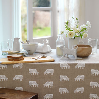 Country Kitchen Table Choose a natural linen with a simple cow print for your breakfast table, teaming it with hand thrown ceramics and a porcelain cow creamer