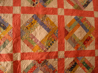 Scrappy 1930s quilt with custom quilting by Angela Huffman - QuiltedJoy.com
