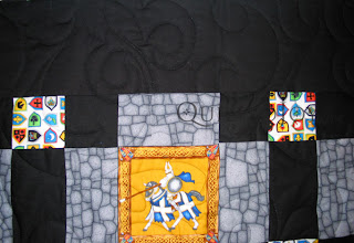 Fun knights and castles quilts, perfect for a grandson! Angela Huffman quilted the Funky Fleur de Lys pantograph - QuiltedJoy.com