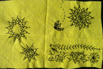 mostly fly stitch on a bit of yellow felt