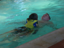 Parker and Daddy swimming at the lodge