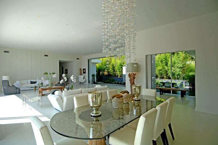 [hillcrest+dining+room+living+room+white+upholstered+chairs+textured+glass+oval+table+wood+base+glass+bubble+chandelier.jpg]