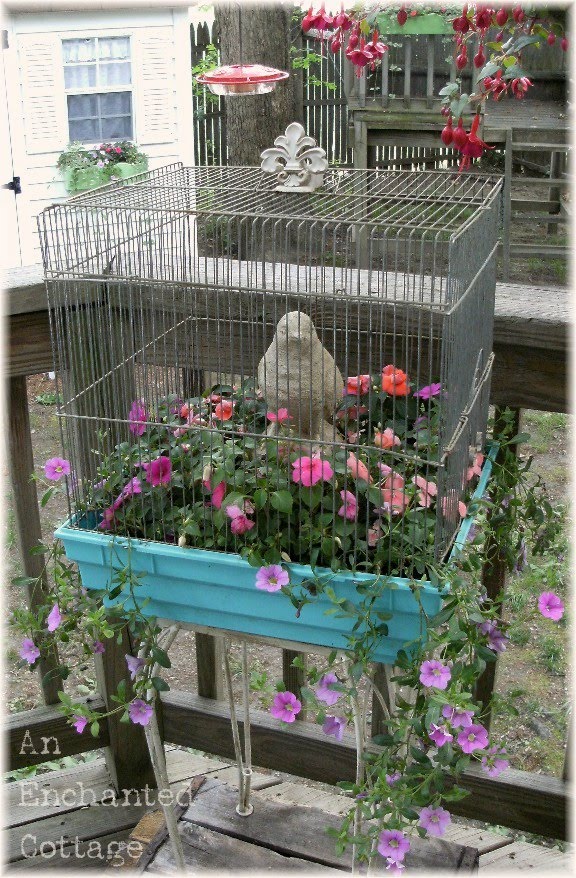 An Enchanted Cottage Another bird cage planter!