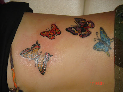 Colorful Butterflies Tattoo at the back