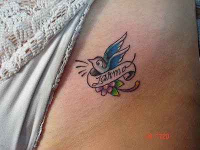Small and Cute Bird Tattoo