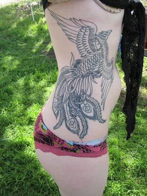 Phoenix Tattoo at the Side of the body